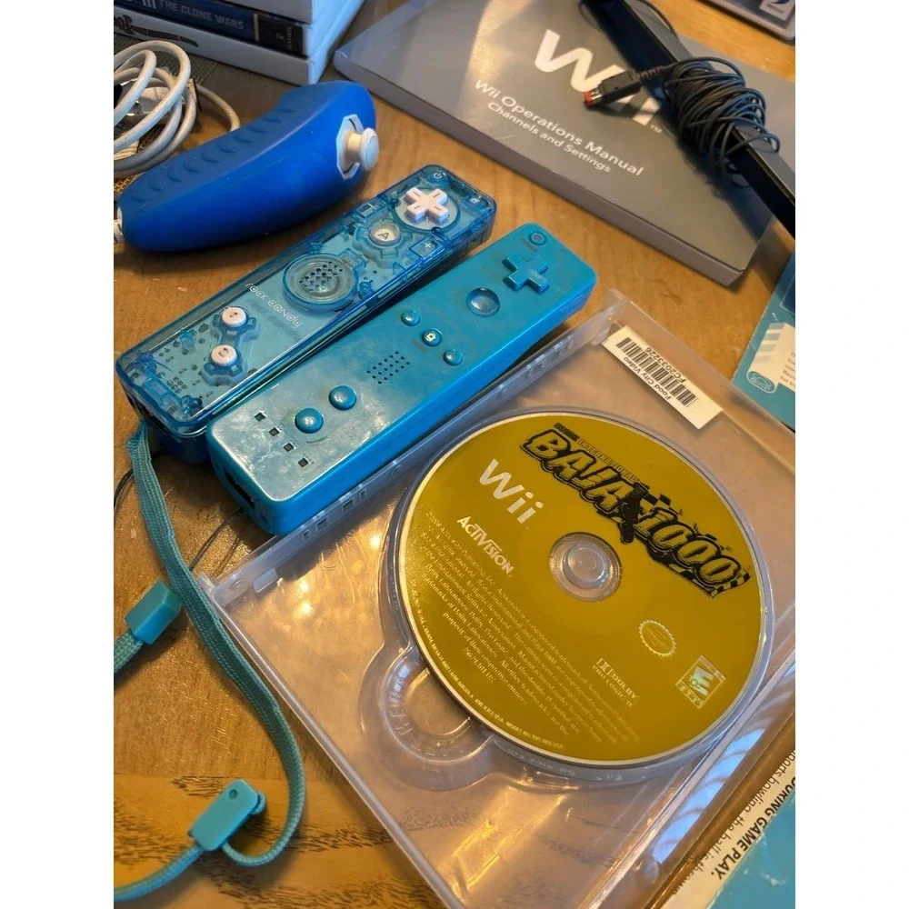 Nintendo Wii. Rare blue limited edition console bundle with Wii box. Many games